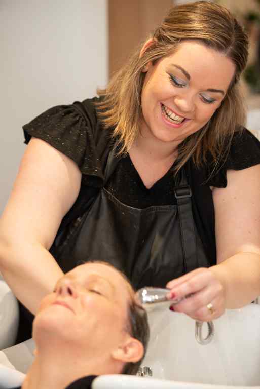 Does washing hair daily damage it?