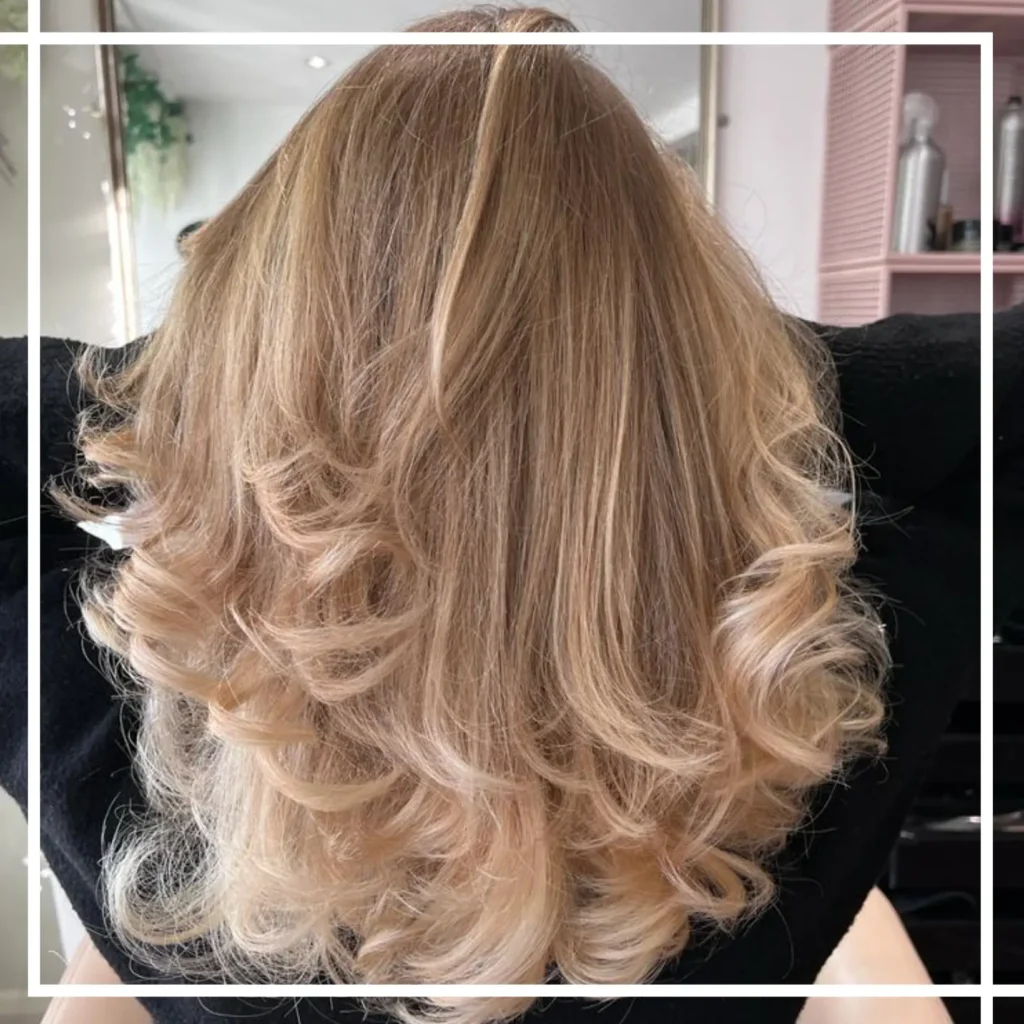 balayage with a curly blow dry