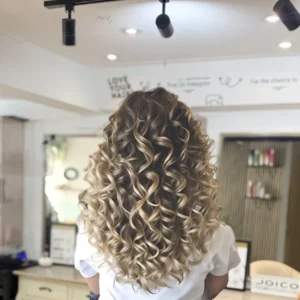 thumbynail perm on highlighted hair